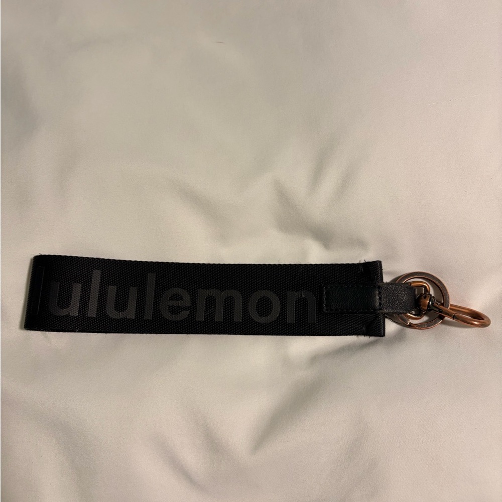 lululemon athletica Black and Copper Never lost Key chain